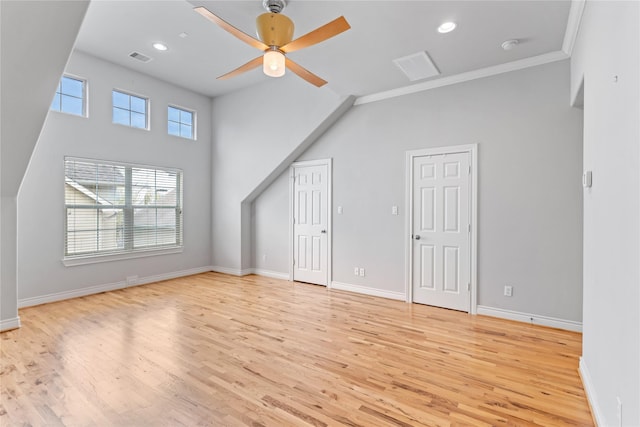 unfurnished living room featuring a ceiling fan, visible vents, baseboards, light wood finished floors, and recessed lighting