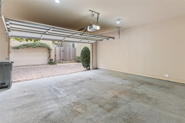 garage featuring a garage door opener