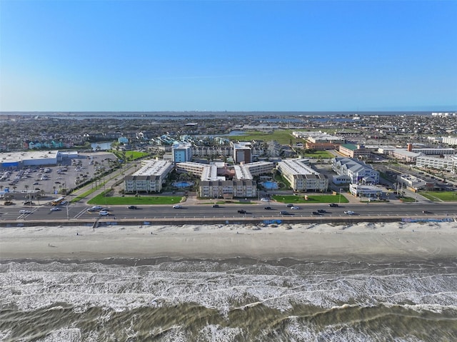 birds eye view of property with a city view and a water view