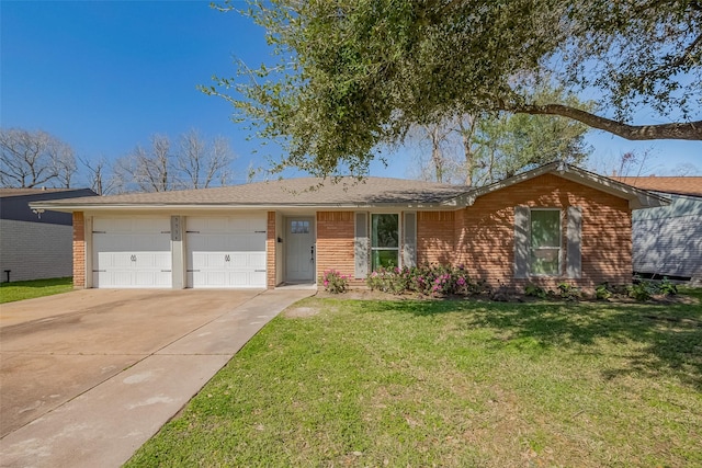 ranch-style home with a garage, driveway, a front lawn, and brick siding