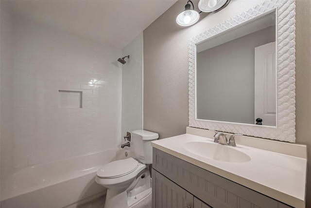 full bathroom featuring shower / bathtub combination, vanity, and toilet