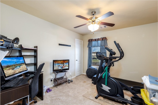 interior space with visible vents, baseboards, and ceiling fan