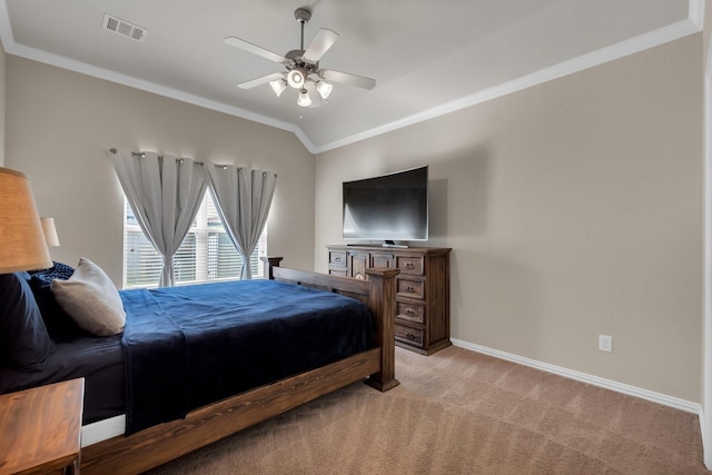 bedroom with visible vents, ornamental molding, light carpet, vaulted ceiling, and baseboards