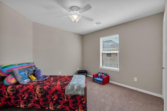 bedroom featuring ceiling fan, carpet flooring, visible vents, and baseboards