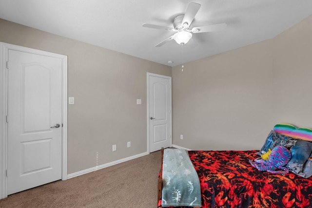 bedroom featuring carpet, ceiling fan, and baseboards