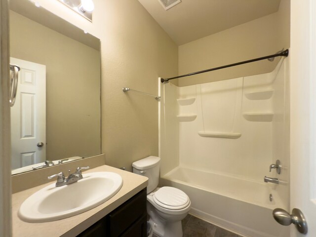 full bathroom with toilet, shower / tub combination, visible vents, and vanity