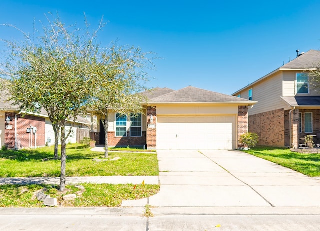 view of front of house with concrete driveway, brick siding, an attached garage, and a front lawn