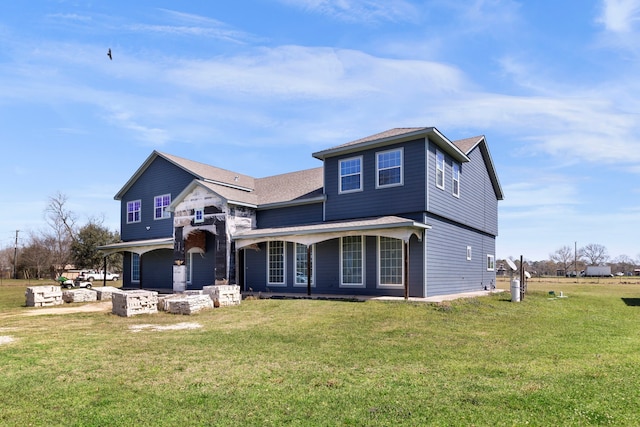 2464 N Walker Rd, Cleveland, TX 77328 - traditional-style home with a front lawn, a porch, and roof with shingles
