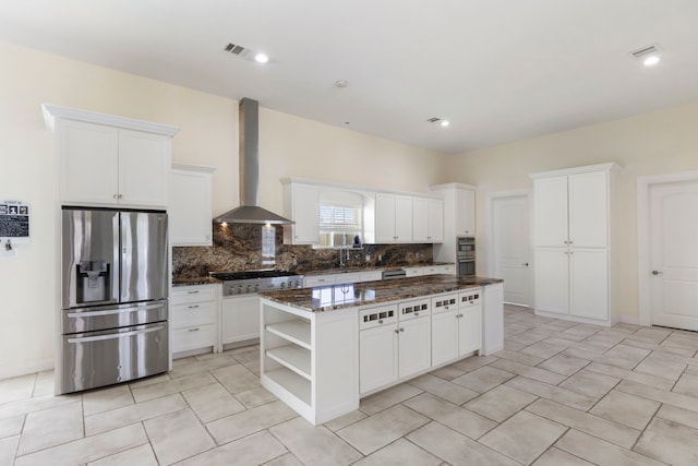 kitchen featuring a center island, open shelves, stainless steel appliances, decorative backsplash, and wall chimney exhaust hood