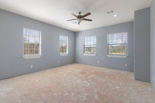 unfurnished room featuring ceiling fan, visible vents, and recessed lighting