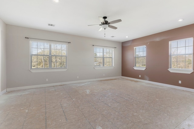 spare room featuring recessed lighting, visible vents, ceiling fan, and baseboards