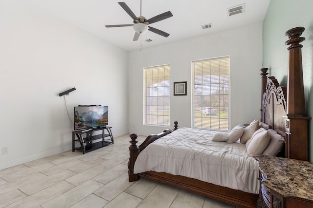 2464 N Walker Rd, Cleveland, TX 77328 - bedroom featuring baseboards, a ceiling fan, and light tile patterned flooring