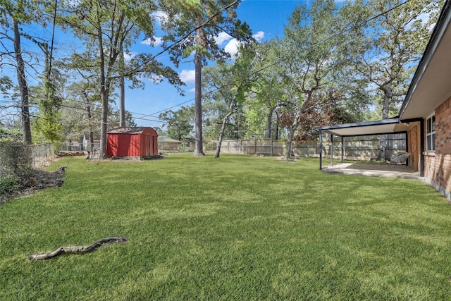 view of yard featuring a fenced backyard, an outdoor structure, a storage shed, and a patio