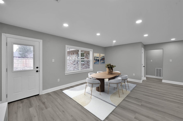 dining area with a wealth of natural light, visible vents, and recessed lighting