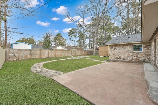 view of yard featuring a patio and a fenced backyard