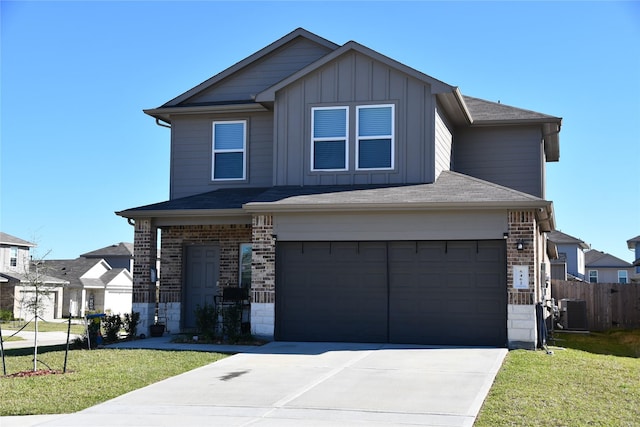 view of front of property with board and batten siding, brick siding, fence, and driveway