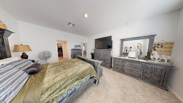 bedroom featuring light carpet and visible vents