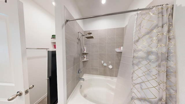 full bathroom with shower / tub combo with curtain