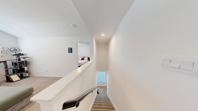 corridor with carpet floors, recessed lighting, visible vents, and baseboards