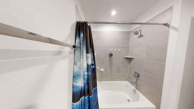 bathroom with shower / bathtub combination with curtain