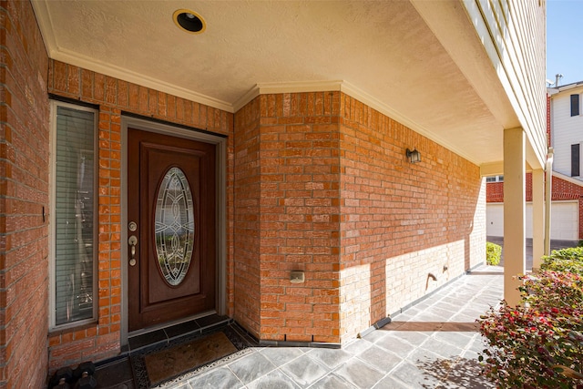 entrance to property with brick siding