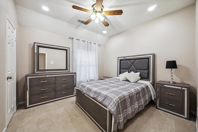 bedroom with recessed lighting, visible vents, light carpet, and lofted ceiling