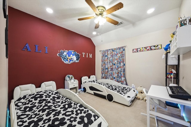 carpeted bedroom featuring visible vents, recessed lighting, ceiling fan, and vaulted ceiling