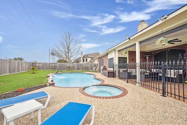 view of swimming pool with a fenced in pool, a fenced backyard, a yard, an in ground hot tub, and a patio