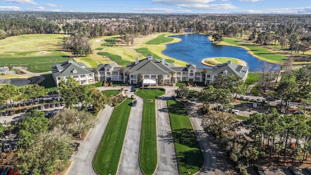 aerial view featuring a water view and golf course view