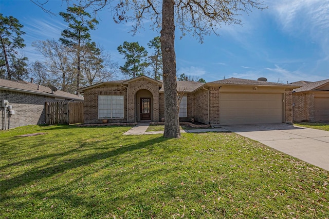 view of front of home featuring driveway, an attached garage, fence, a front lawn, and brick siding