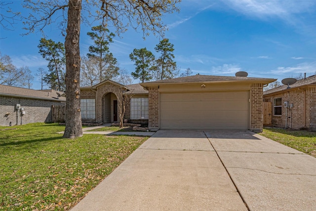 view of front facade featuring an attached garage, driveway, a front yard, and brick siding