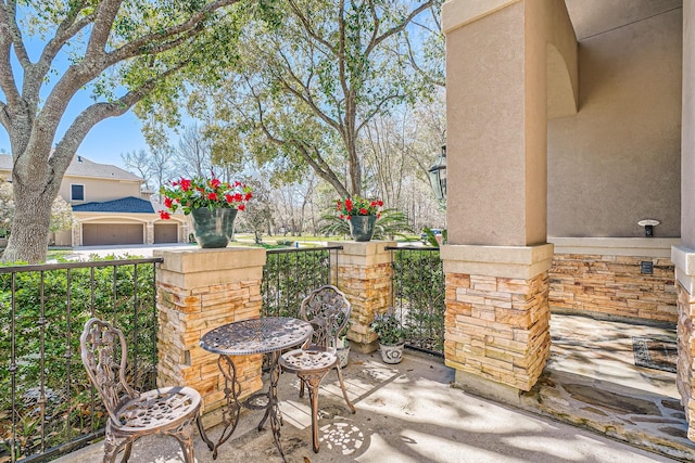 view of patio with a garage