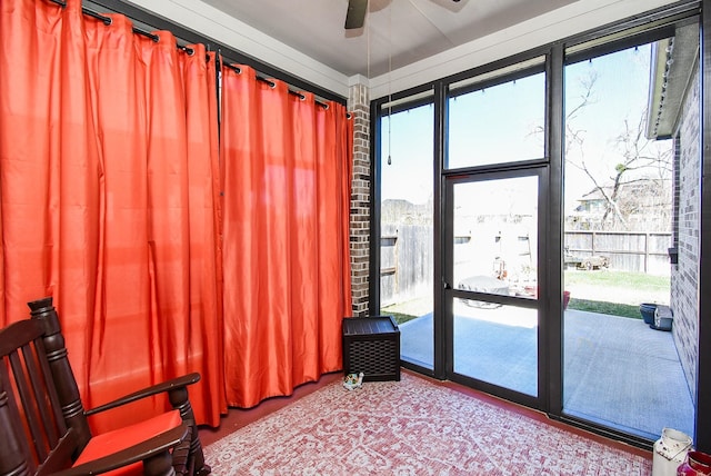 living area featuring ceiling fan