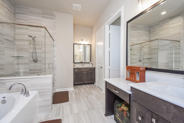 full bath featuring visible vents, two vanities, a stall shower, a sink, and a bath