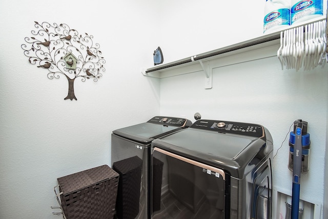 laundry area featuring laundry area and separate washer and dryer