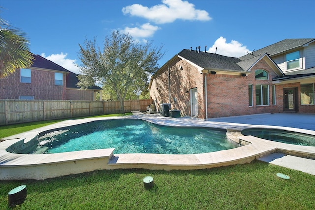 view of pool featuring a fenced backyard, a patio, a fenced in pool, and an in ground hot tub