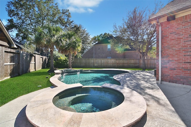 view of swimming pool with a fenced backyard, a pool with connected hot tub, a patio, and a yard