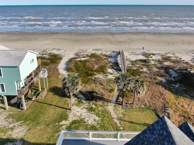 aerial view with a beach view and a water view