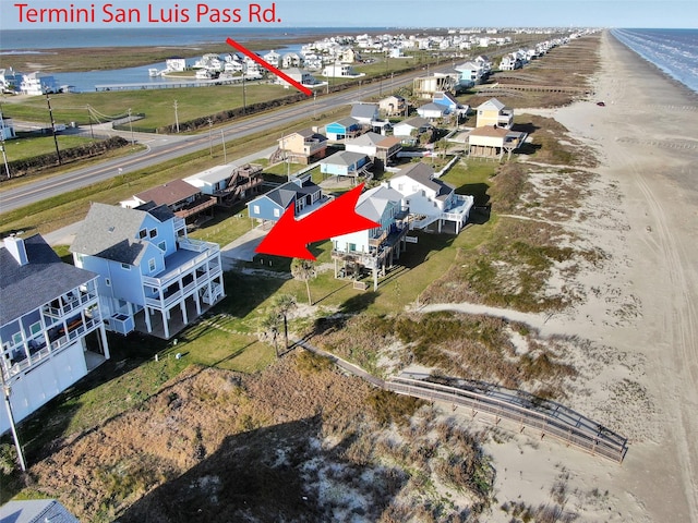 aerial view featuring a water view and a residential view