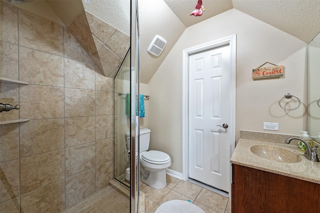 bathroom featuring toilet, a shower stall, visible vents, and lofted ceiling