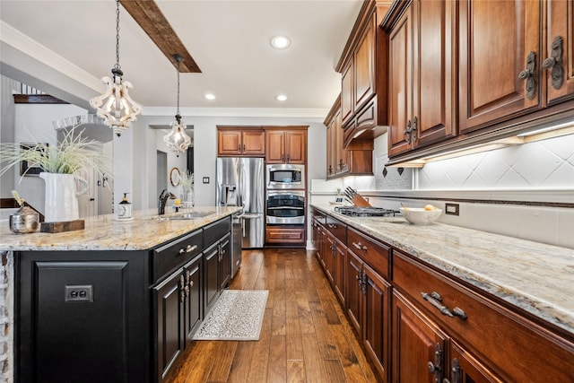 kitchen with stainless steel appliances, dark wood-type flooring, ornamental molding, a sink, and light stone countertops