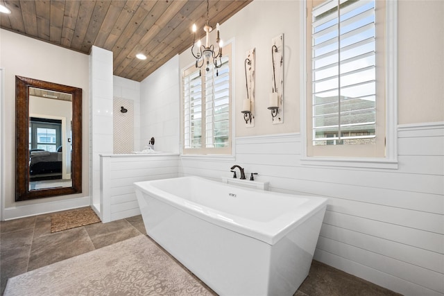 bathroom featuring a wainscoted wall, recessed lighting, wood ceiling, a freestanding tub, and walk in shower