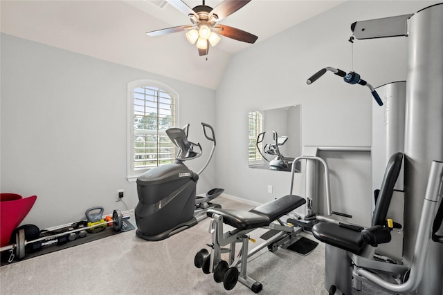 workout room with lofted ceiling, carpet flooring, a ceiling fan, and baseboards