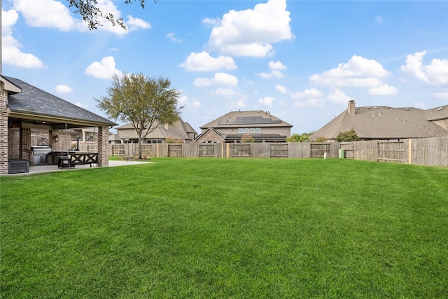 view of yard with a patio area and fence