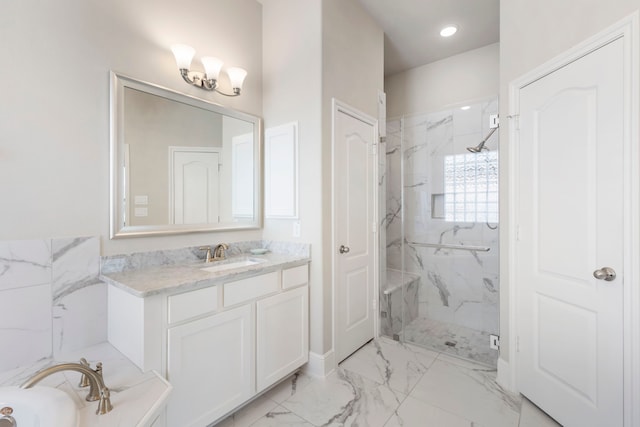 bathroom with a garden tub, marble finish floor, recessed lighting, a marble finish shower, and vanity