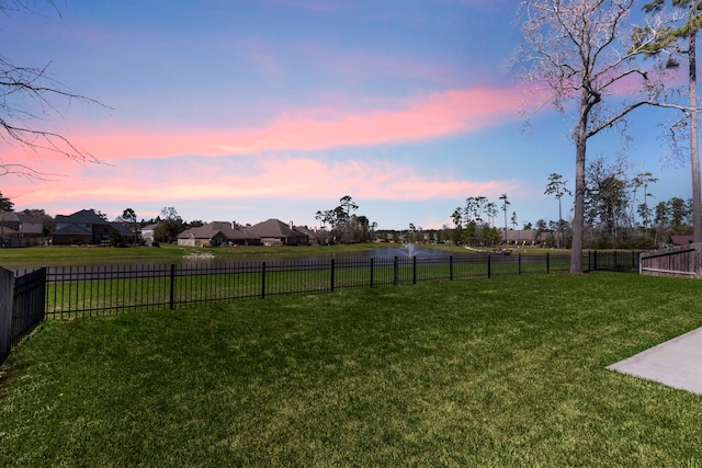 yard at dusk with fence