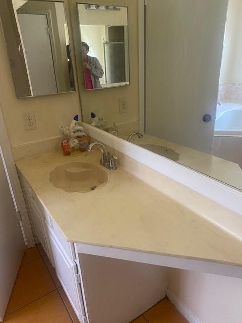 bathroom featuring vanity and tile patterned floors