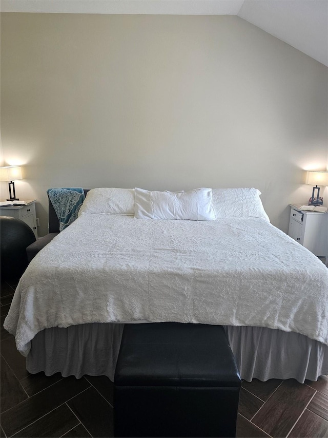 bedroom with vaulted ceiling