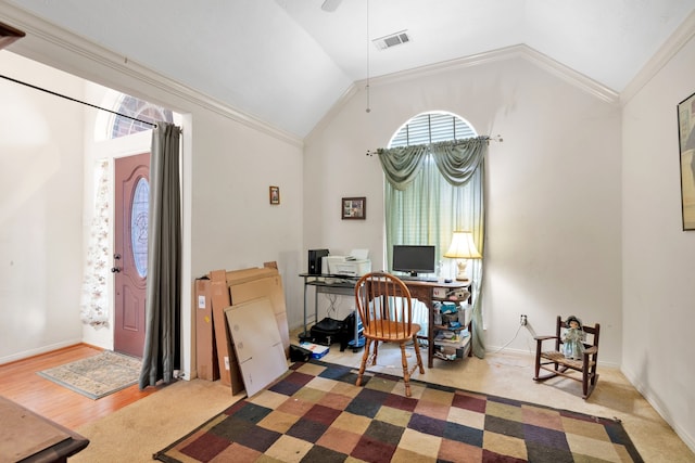 carpeted office space featuring lofted ceiling, baseboards, visible vents, and crown molding