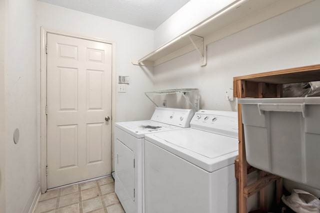 washroom with laundry area and separate washer and dryer